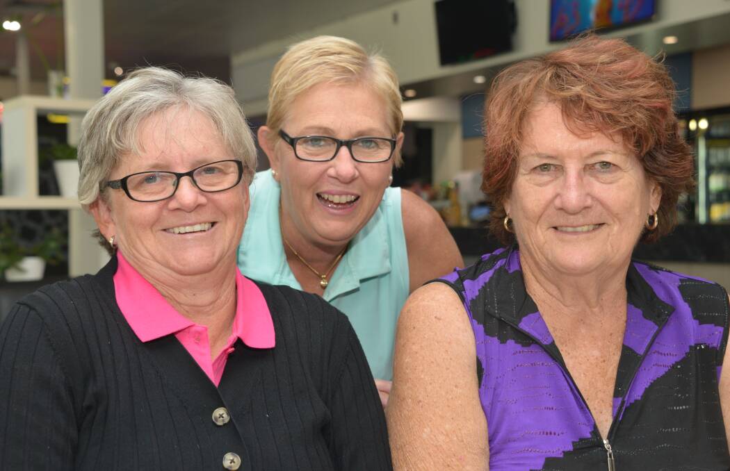 BIG GRINS: The Redland Bay Ladies Golf Club were in good spirits as the cheque was handed over to the Red Rose Foundation on Tuesday. Photos: Jordan Crick