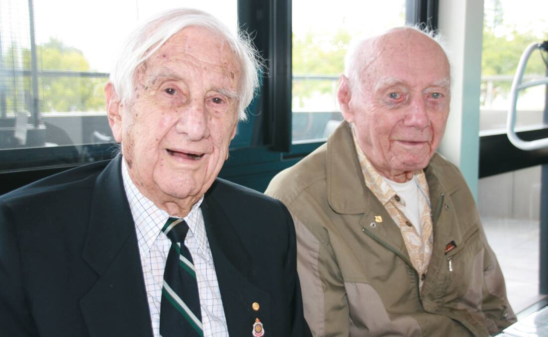MEMORIES: Stan Mellick and Dennis Wellbelove, both army veterans, share a yarn over lunch at Redlands RSL. Photo: Jordan Crick