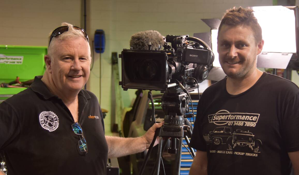 LIGHTS, CAMERA, ACTION: Rob Fazzino and Todd Malseed were filming in the workshop on Thursday ahead of the fan event on Saturday. Photo: Jordan Crick 