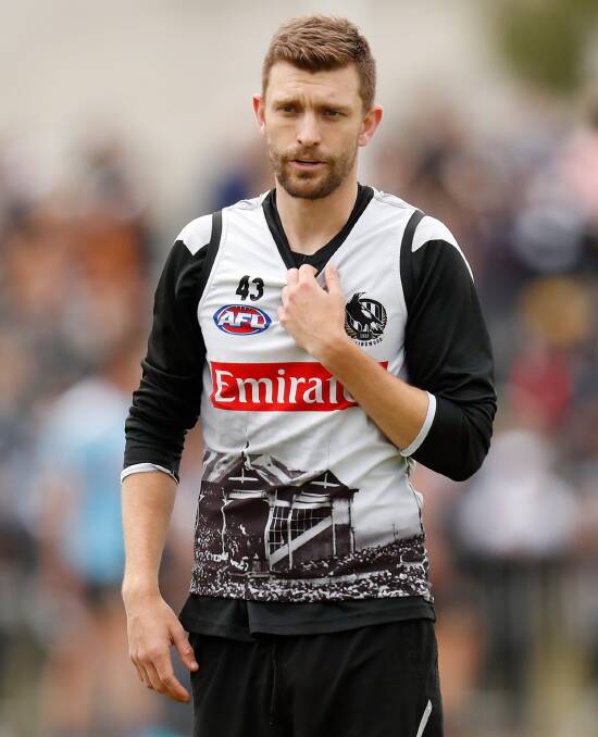 HOMECOMING: Adam Oxley, otherwise known as the Ox, during his time with the Collingwood Magpies AFL side. Photo: Scott Barbour/AFL Photos.