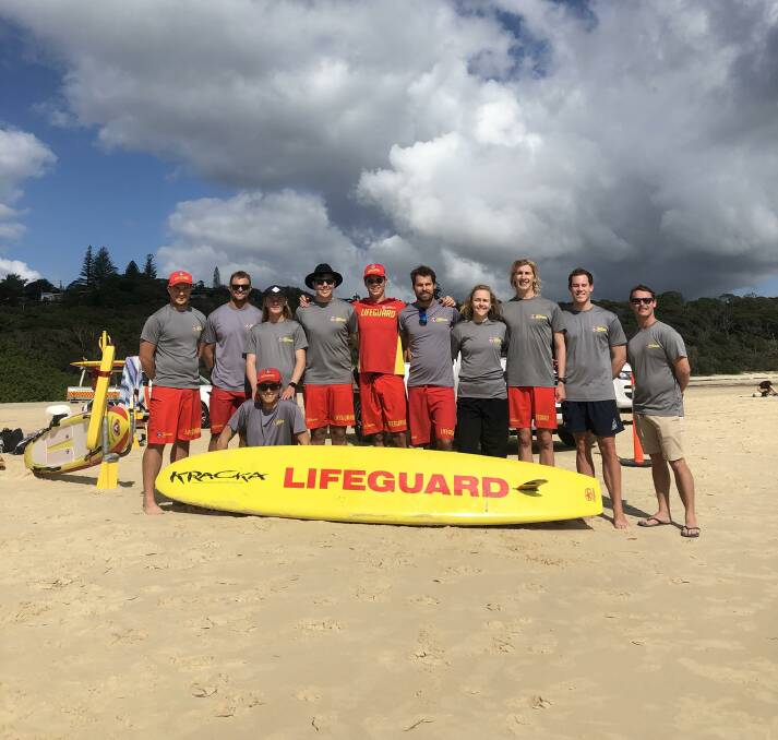 BIG WAVES: Lifeguards take a quick break for a picture during the fitness testing session at North Stradbroke Island. 