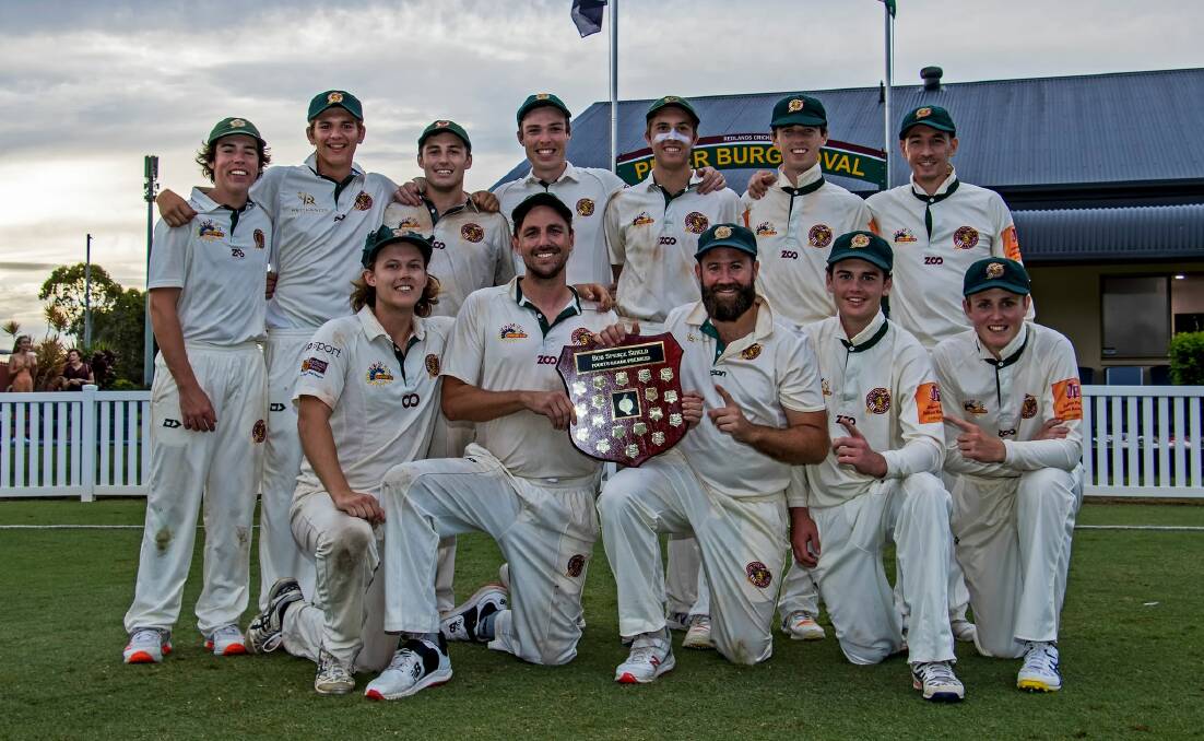 WINNERS: Fourth grade lift the premiership shield after beating University of Queensland in the grand final. Photo: supplied