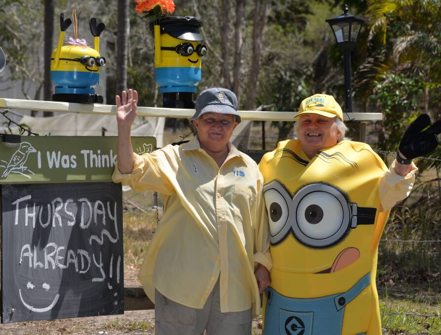 JOY: The sisters are eager to dress up in their minion outfits and wave at passersby. Photo: Jordan Crick. 