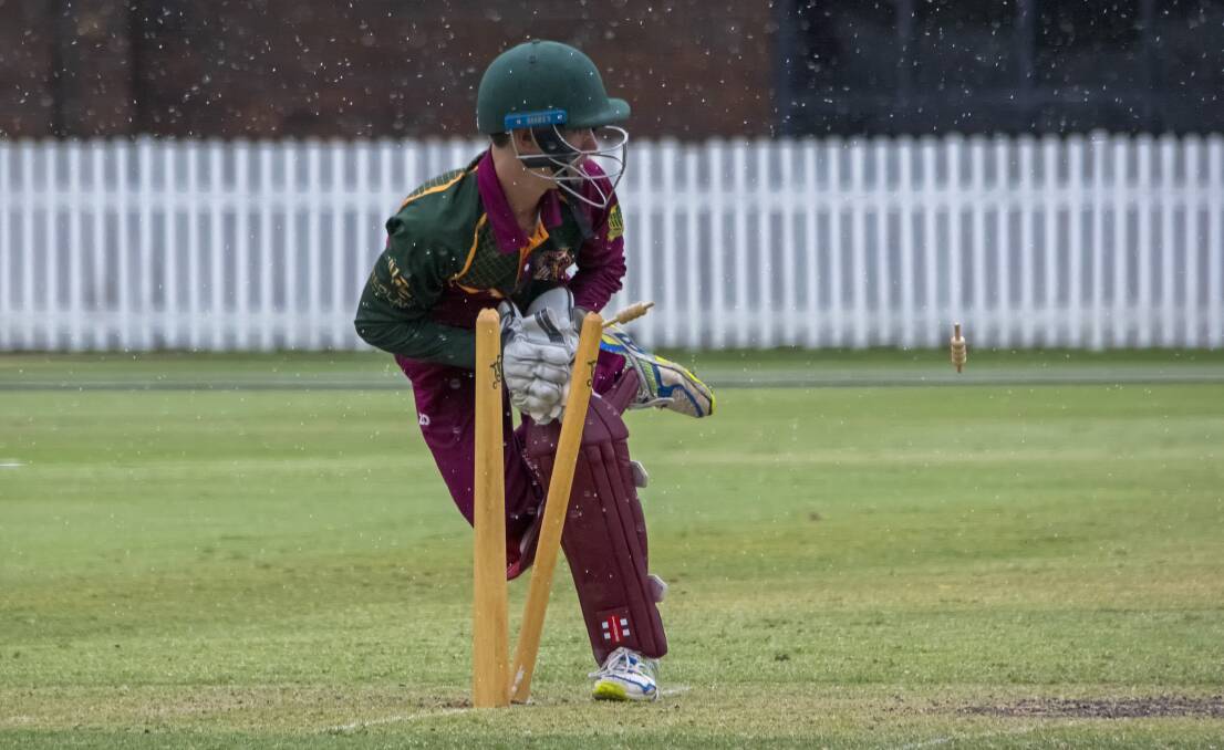 RUN OUT: Wicket-keeper Reuben Burger in action for Redlands Tigers during the under 16 Lord's Taverners final at Allan Border Field. Photo: Doug O'Neill 
