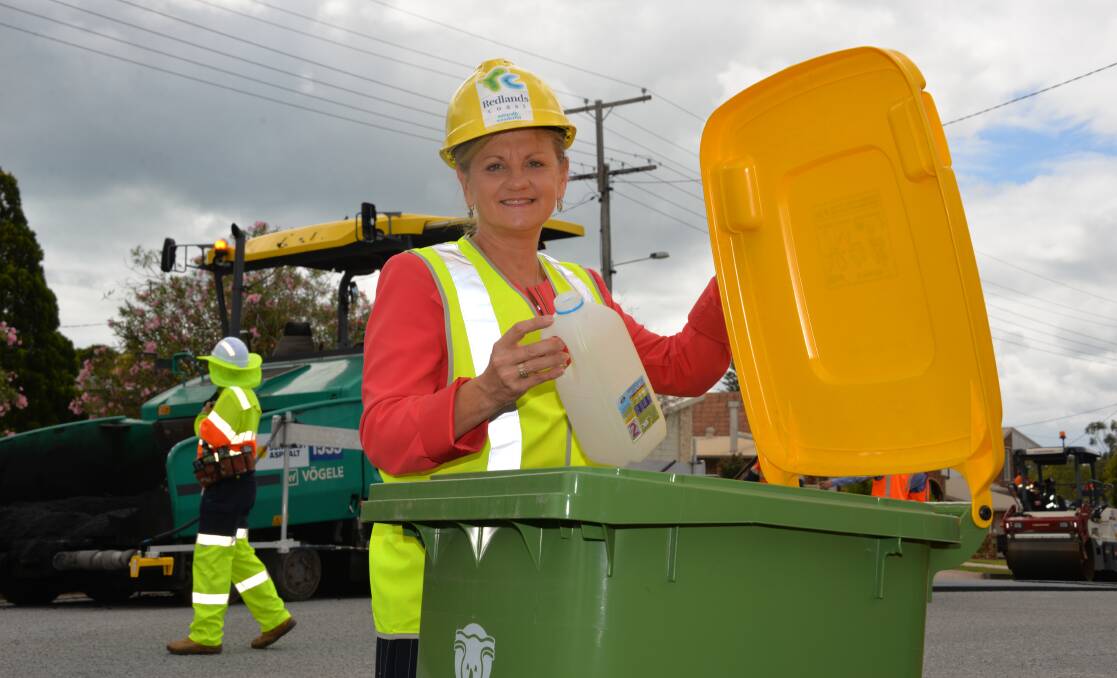 RECYCLING: Redlands mayor Karen Williams does her part to keep the environment clean. Photo: Jordan Crick. 