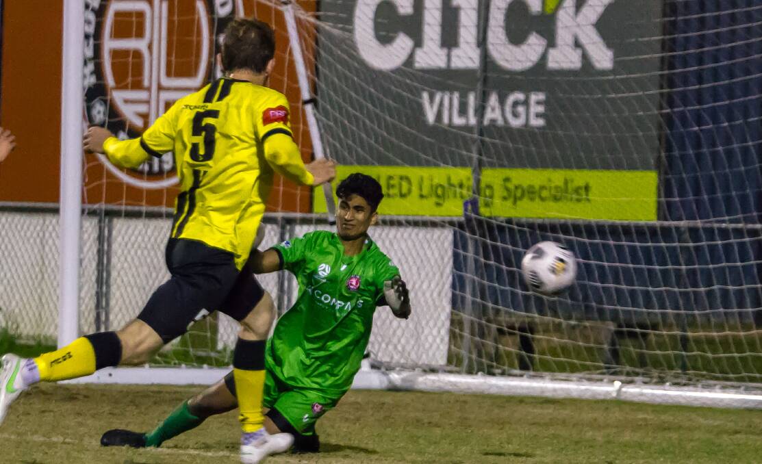 SHINING LIGHT: Redlands United shot-stopper Joel D'Cruz had a good game for the Red Devils, making a number of vital saves. Photo: Ray Gadmer