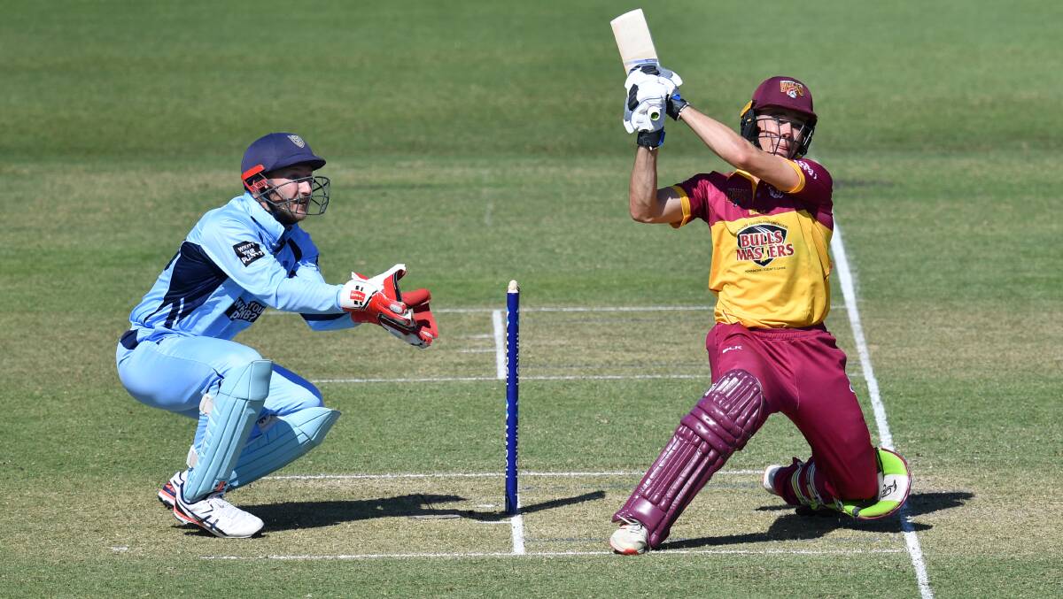 SHOT: Sam Heazlett swings one away to the boundary during a one-day clash with New South Wales. Photo: Cricket Australia/ Getty Images