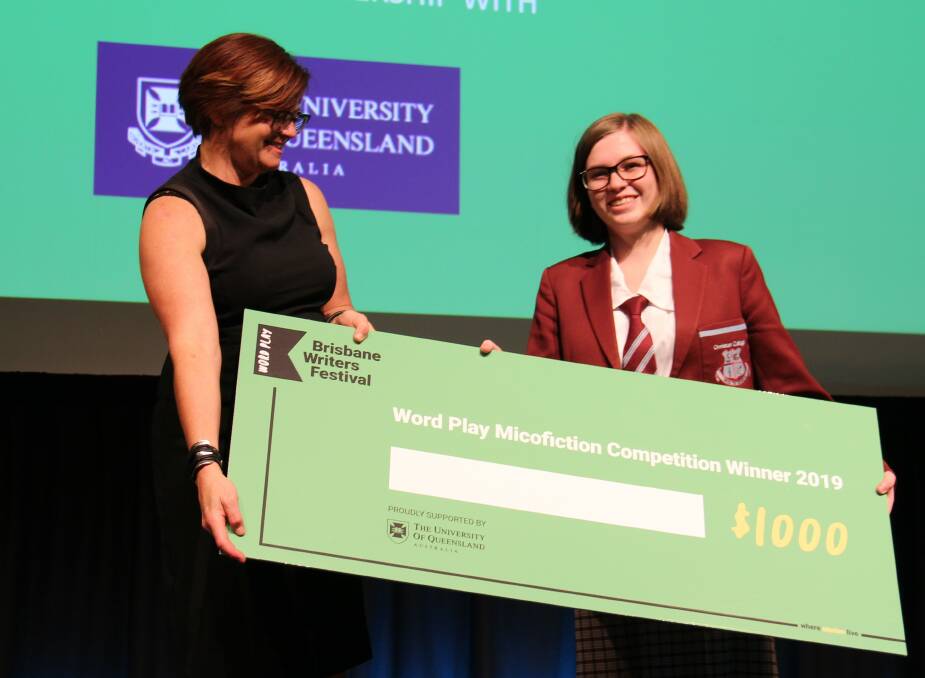 NOVELIST: Tarni McCosker from Ormiston College receiving her winners cheque from professor Heather Zwicker of the University of Queensland. Photo: Tony Robertson