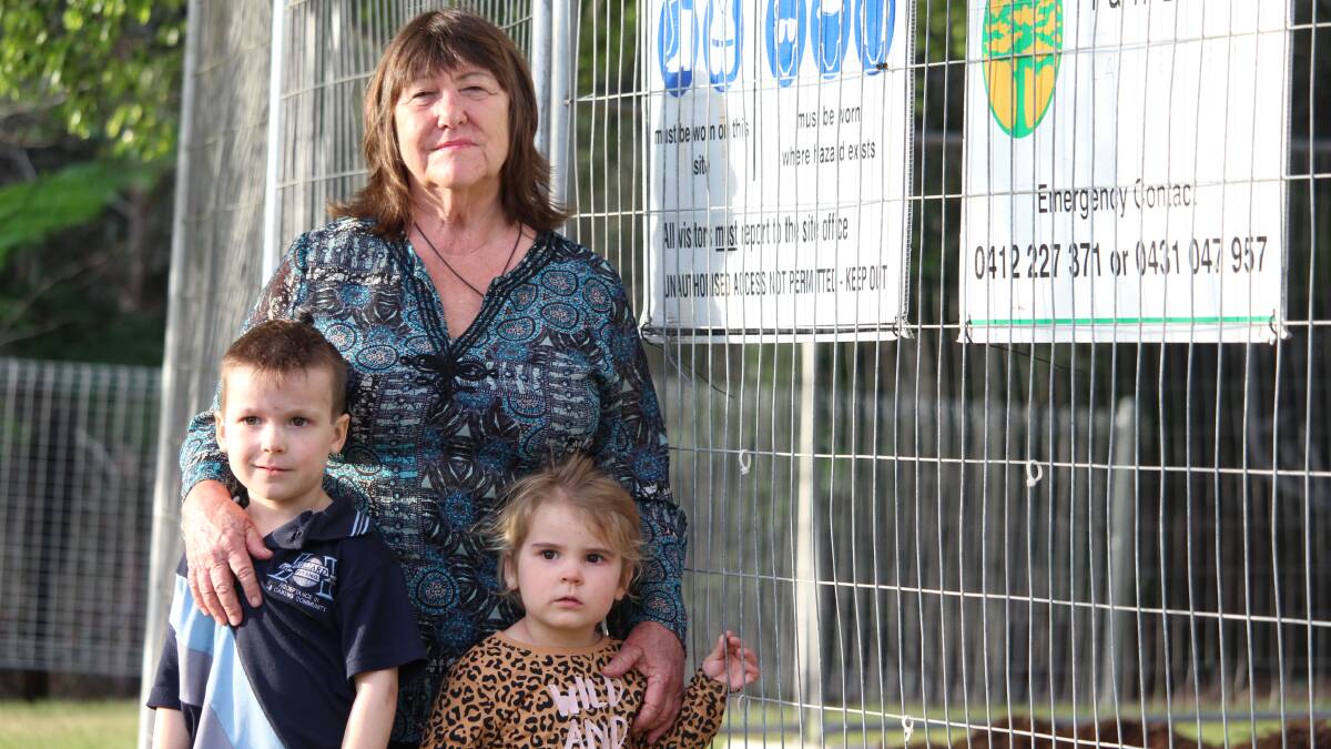 WORK BEGINS: Candi Kelly with grandchildren Chase and Harper Kelly at the construction site in Bellini Court park, Alexandra Hills. Photo: Jordan Crick