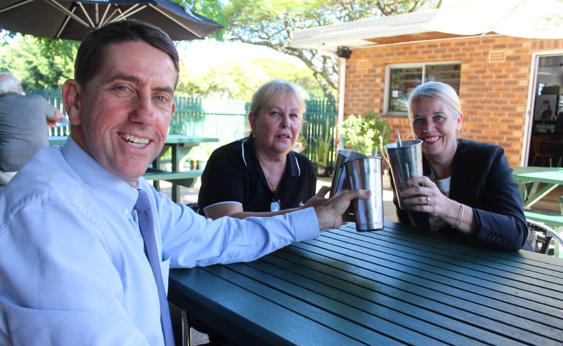 CHEERS: Sisu Cafe owner Anna Hobbs (middle) with Treasurer Cameron Dick and Redlands MP Kim Richards. 