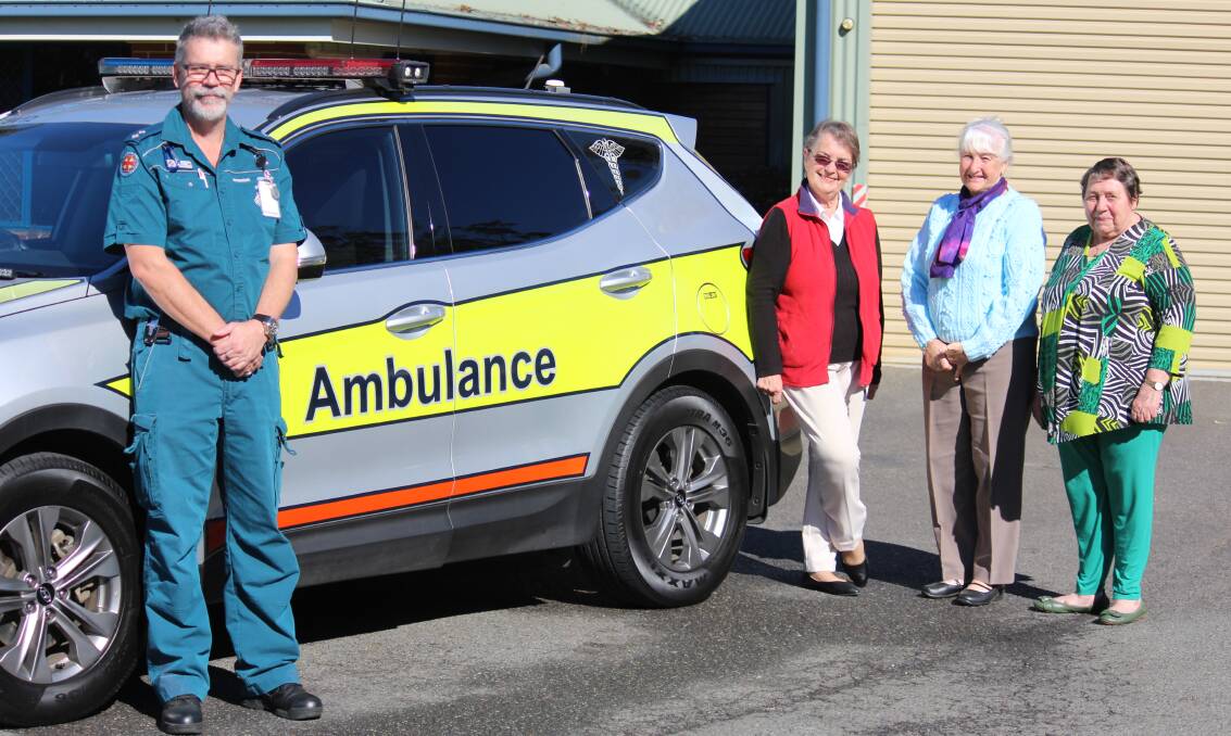 20 YEARS: Redland Bay ambulance station officer in charge Camron Morris with committee members Doreen Nichols, Jan Sommerville and Evelyn Richardson. 