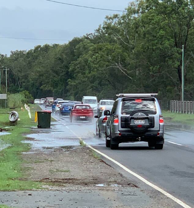 DRENCHED: Flooding on Rickertt Road caused major delays for motorists travelling from Redlands to Brisbane. 