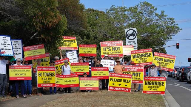 NO TO UNITS: About 30 people turned out at Cleveland on Wednesday morning to protest the proposed Toondah Harbour development. Photo: Chris Walker