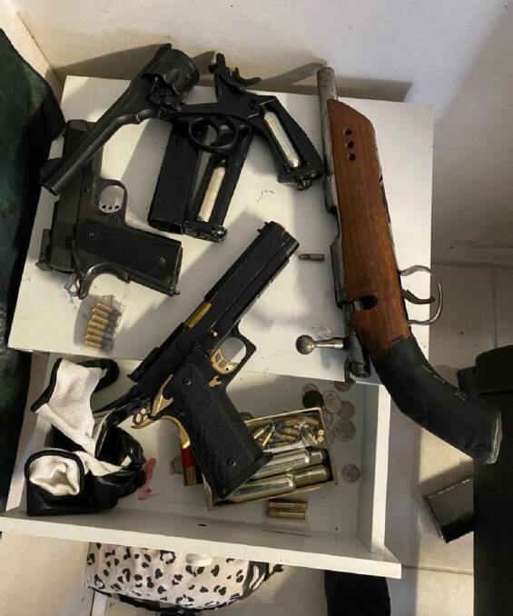 DANGEROUS: Weapons were seized after raids at south-east properties, including Redland Bay and Logan. 