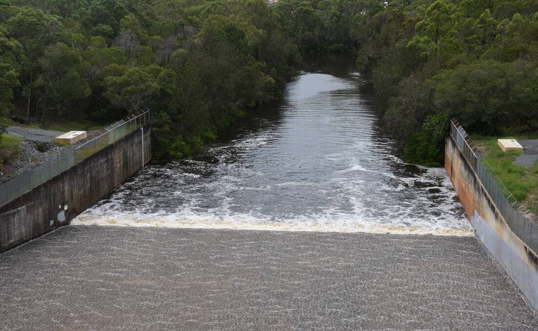CREEK: Water escapes down the spillway and into Tingalpa Creek at Leslie Harrison Dam in February 2020. 