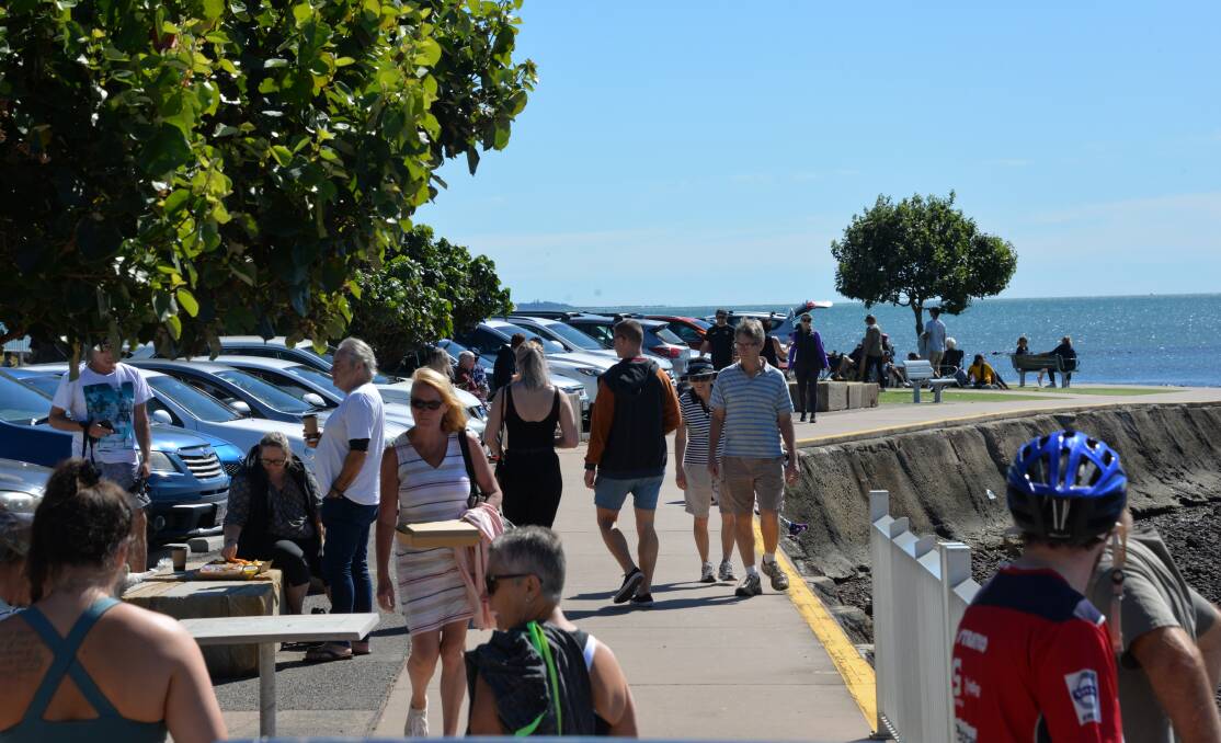BUSY: Beaches were lined with people at Cleveland as the state government's relaxed COVID-19 restrictions took effect. 