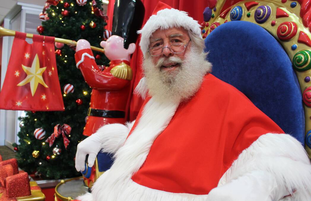 FAMILIAR FACE: Geoff Bowden has played Santa Claus at Victoria Point Shopping Centre for 15 years. Photo: Jordan Crick