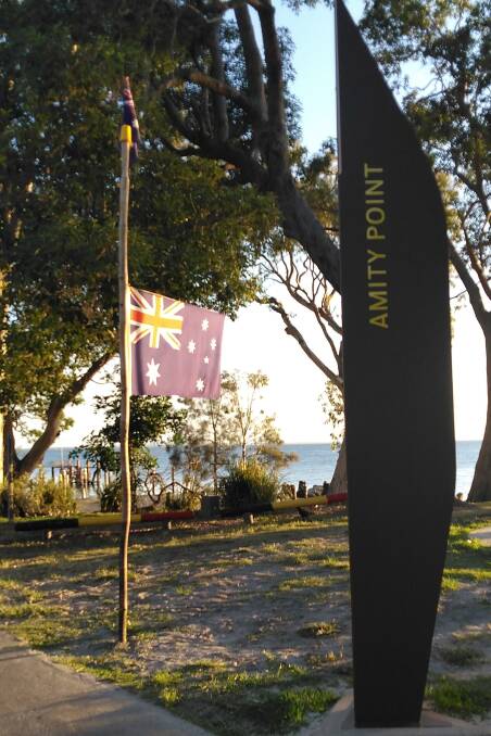 STICKING POINT: The flag pole in Cabarita Park at Amity Point, North Stradbroke Island had become a beacon of community spirit. 