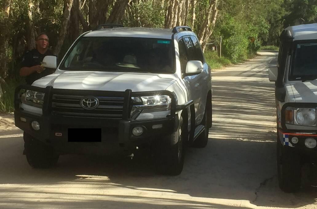 HOONS TARGETTED: North Stradbroke Island police test beach drivers for drink and drug driving at Christmas.