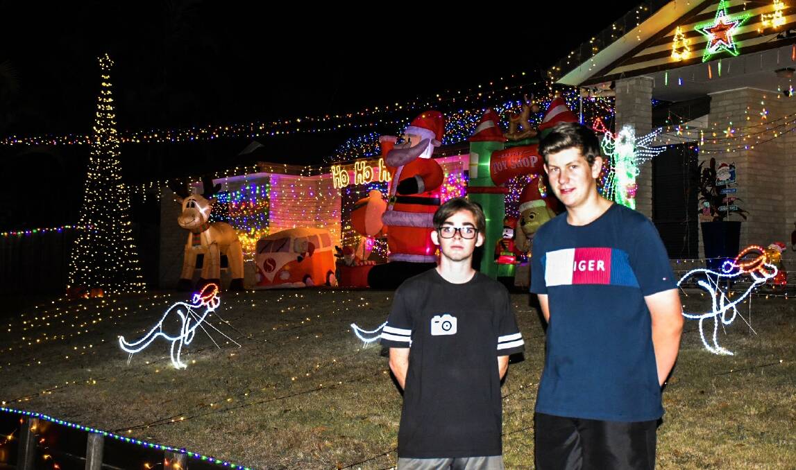The brains behind the magical Christmas light display at Redland Bay - Michael Mahaffey, 17, and Luke Francis, 15. 
