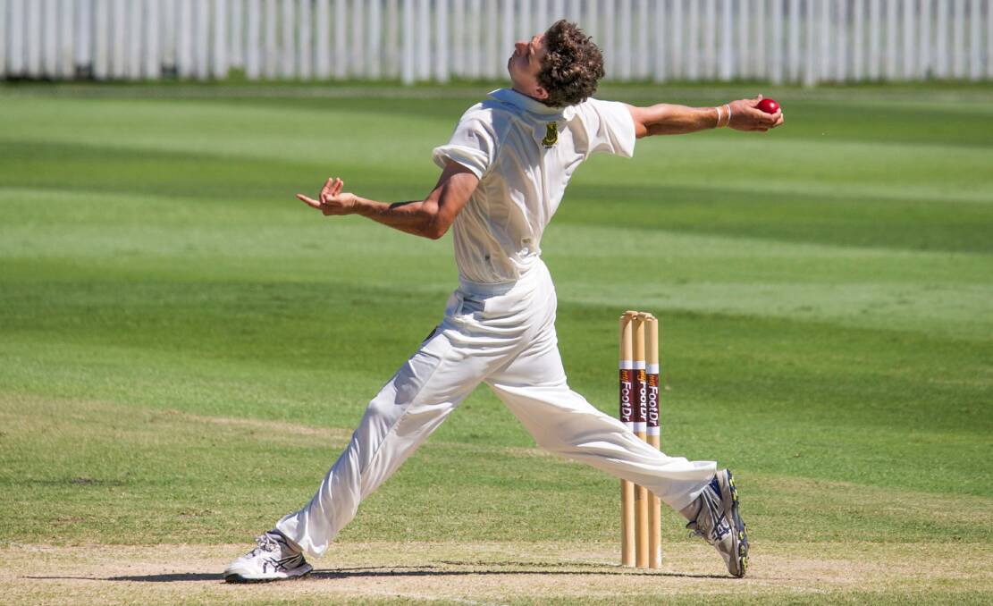 MAN OF THE MATCH: Redlands Tigers' Simon Milenko in action. Milenko took 11 wickets in the match and won the Andy Bichel player of the final. Picture: Alan Minifie