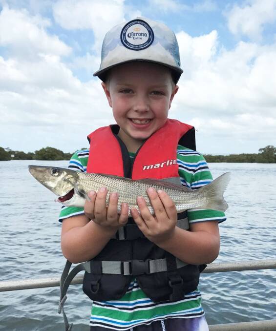 PROUD ANGLER: Thomas Brehmer landed this 38cm whiting at Jumpinpin. There have also been good catches of mulloway around the Seaway and Jumpinpin Bar.