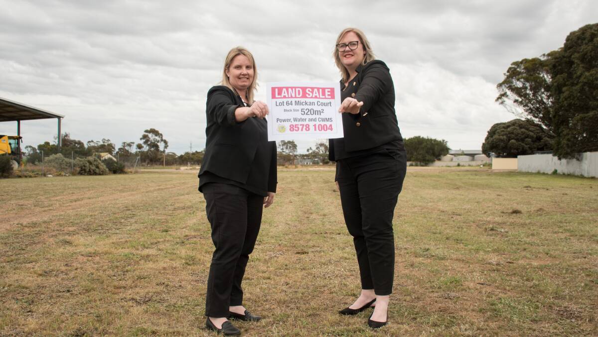 Cut the price of blocks by 90 per cent and suddenly there's a waiting list. Karoonda's Katrina Fromm and the town's mayor Caroline Phillips are all smiles. Photo: Dani Brown