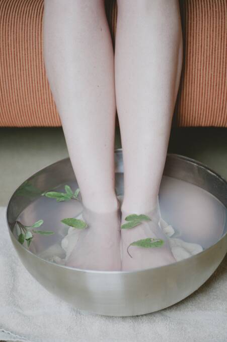 COOL: Soaking your feet in water can help you stay cool in extreme heat, says Dr Young.