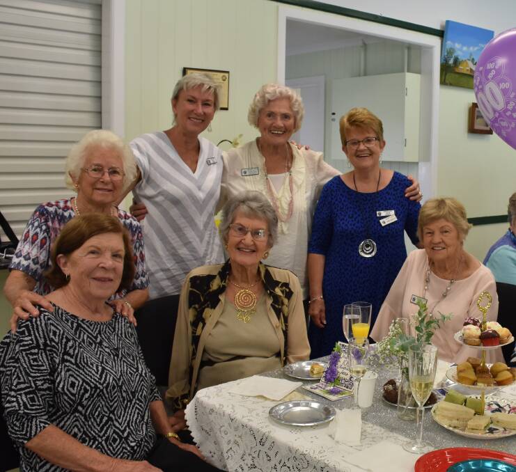 HIP HIP HOORAY: The Redlands Ladies Probus Club celebrate Jean's birthday in style. Wishing her a happy 100th birthday is Mary Sweetapple, Dorothy Deasey, Rita Fleming, Sylvia Gallivan, president of the club Sue Murray and Fay Millar.