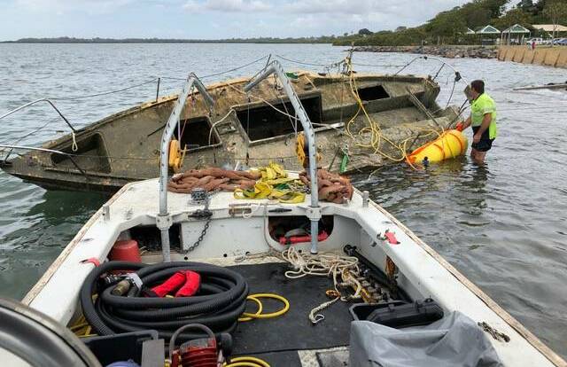 WRECKED: Contractors Maritime Recovery Group remove an abandoned vessel as part of the War on Wrecks taskforce operation. File photo: Maritime Recovery Group