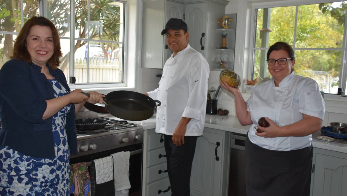 CULINARY SKILLS: Lizzie Sanders with care workers Rashid Davids and Kelly Warren in the kitchen.