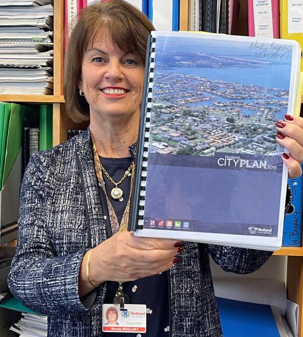 FUTURE: Cr Wendy Boglary with a copy of the Redlands City Plan.