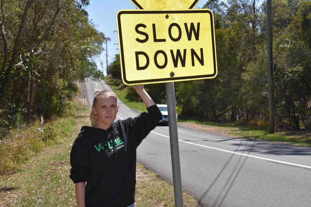 SLOW DOWN: Kristy Atkins urges motorists to slow down on Kinross Road after wallaby road deaths increase in the Thornlands estate. 