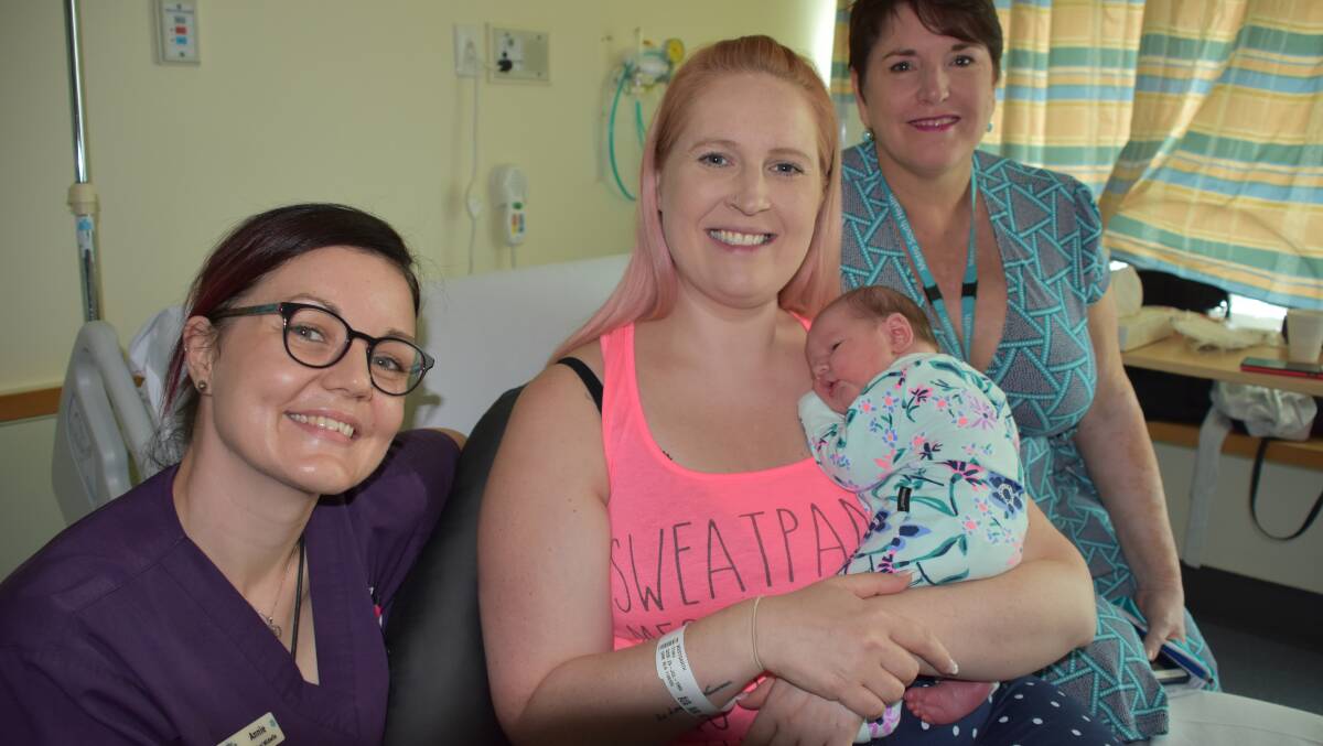 BABY BANTER: Clinical midwife Annie Hampson and Redland Hospital manager Susan Frieberg with mum Tracy Christodoulou and baby Ava.