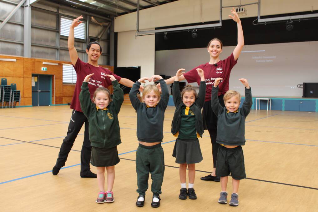 PIROUETTE: Education teaching artists Lydia Melmeth and William Cheung with children from Coolnwynpin State School.