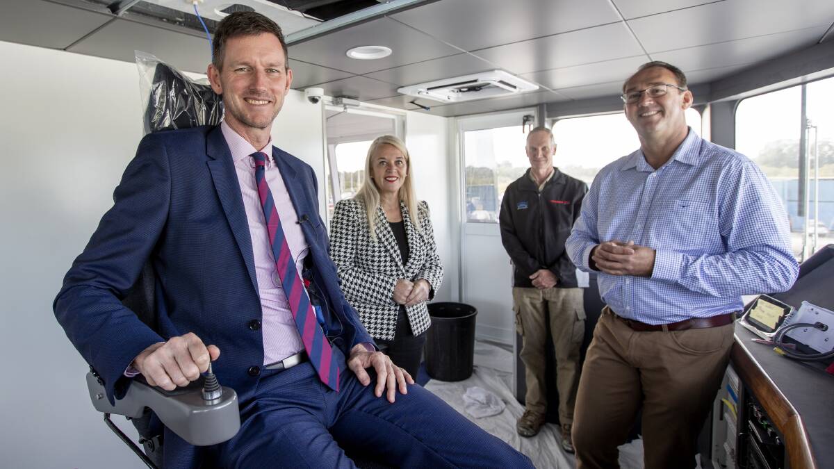 ALL ABOARD: Minister for Transport Mark Bailey, Redlands MP Kim Richards, Aluminium Marine ship yard owner Steve Cordingley, and SeaLink North Queensland general manager Chris Briggs on board the Coolgaree Cat. 