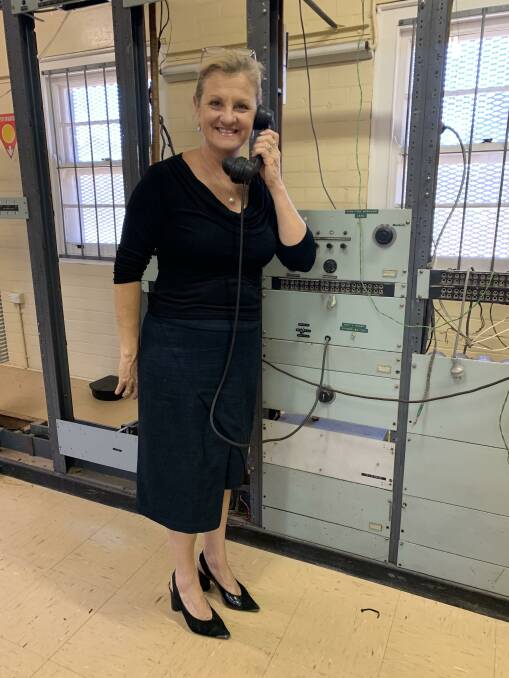 MAKING PLANS: Mayor Karen Williams in the WWII radio station on the Birkdale Commonwealth land. The radio station is believed to have received the first message in Australia in August 1945 that the Japanese had surrendered and was used by General MacArthur. 