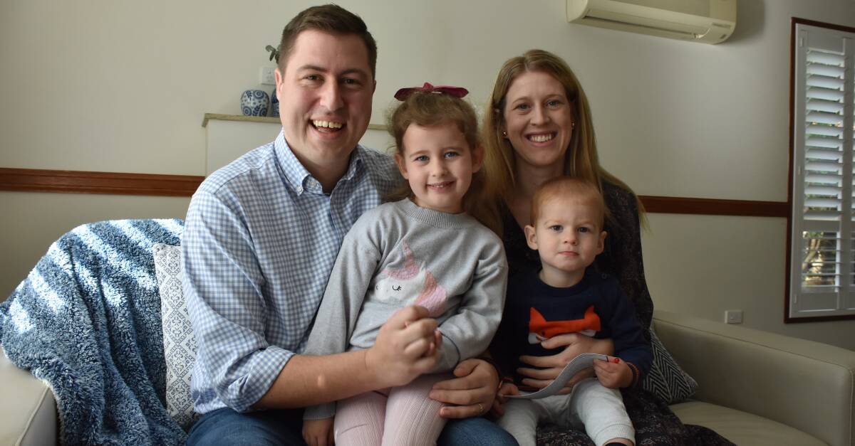HEAD TO HEAD: LNP candidate for Bowman seat Henry Pike with is wife Kate and children Laura, 5, and Christian,1.