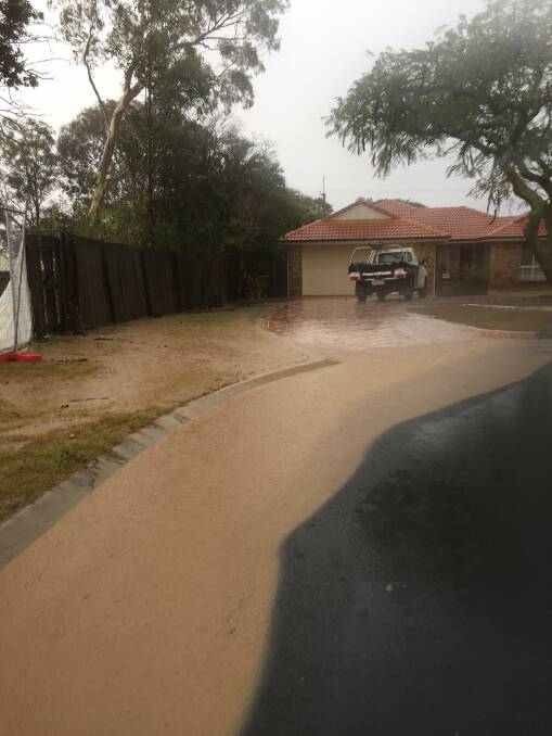 Heavy rain flooded the cul de sac and nearby properties in Gardenia Drive.