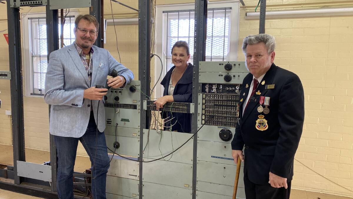 HISTORY: Cr Paul Bishop, Mayor Karen Williams and Redlands RSL sub-branch military wellbeing advocate volunteer Graham Hinson inside the Birkdale radio receiving station. Photo: Redland City Council.
