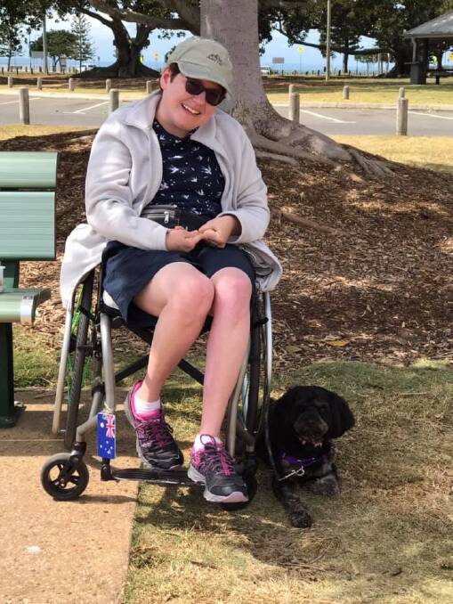 Fiona Lyons with her beloved assistance dog, Aysa.