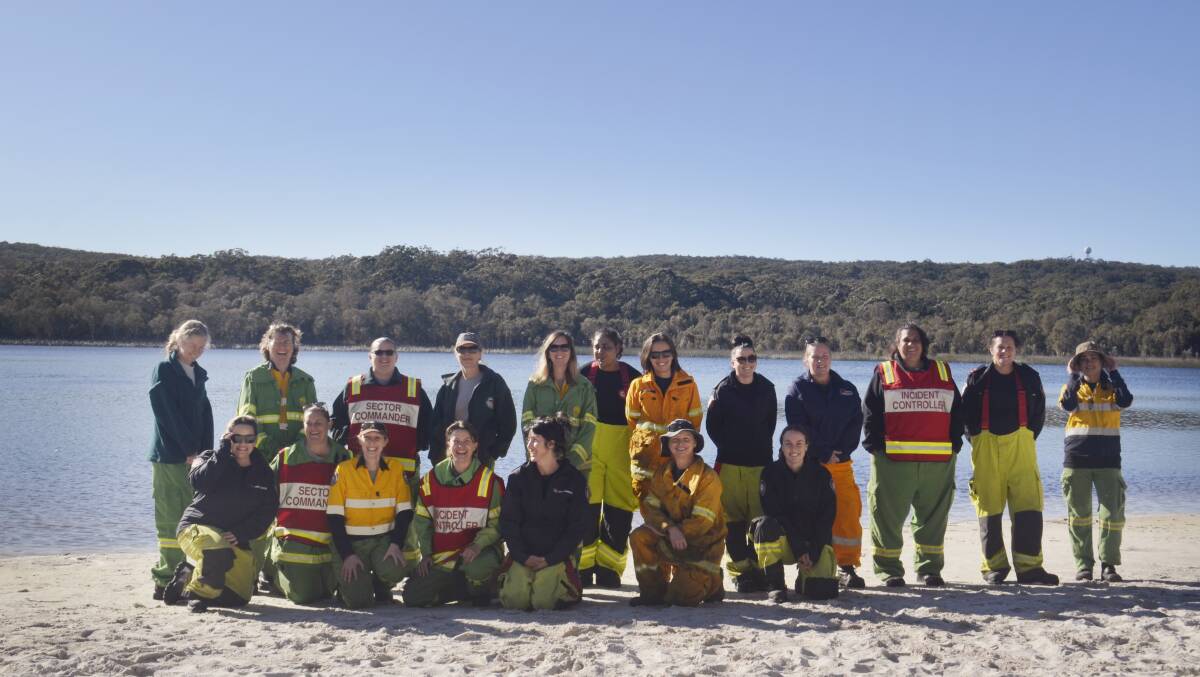 BLAZE: The all-women team from five agencies involved in the planned burn on North Stradbroke Island.