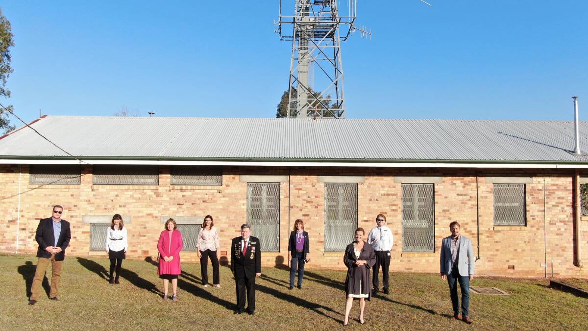 REMEMBERED: Mayor Karen Williams, Graham Hinson from Redlands RSL sub-branch and councillors outside the radio station. Photo: Redland City Council.
