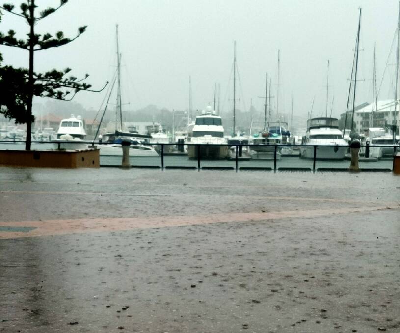 DOWNPOUR: Heavy rain at Raby Bay on Tuesday afternoon.
