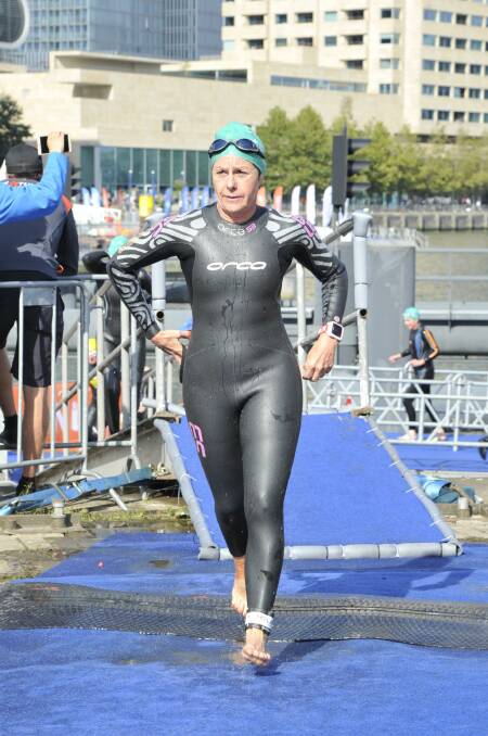 Linda Meredith emerges from the swim leg in Rotterdam.