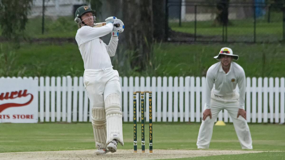 Off the back foot: Michael Herdman swats a ball towards the boundary for Redlands Tigers on the weekend. Photo: Doug O'Neill