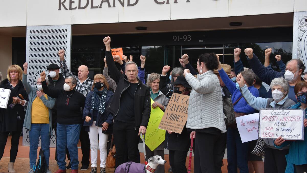 More than fifty people chanted 'the mayor must go' at a protest on Wednesday morning on the footpath of the Redland City Council chambers. PHOTO: JORDI CRICK