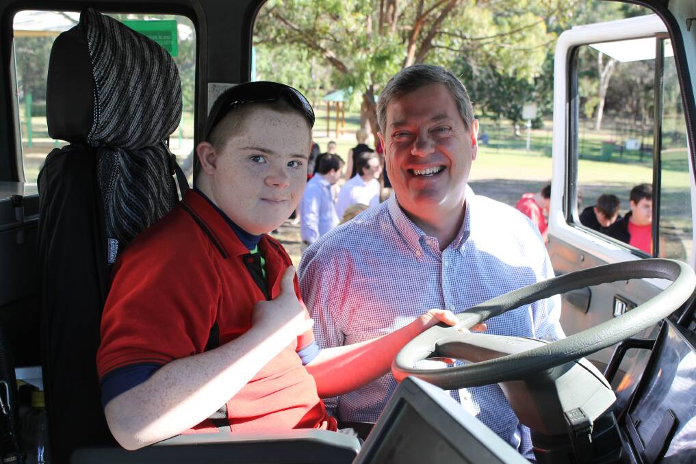 ENVIRONMENT DAY: Redland District Special School student David O'Brien with LNP leader Tim Nicholls at Thornlands on World Environment Day. Photo: Cheryl Goodenough