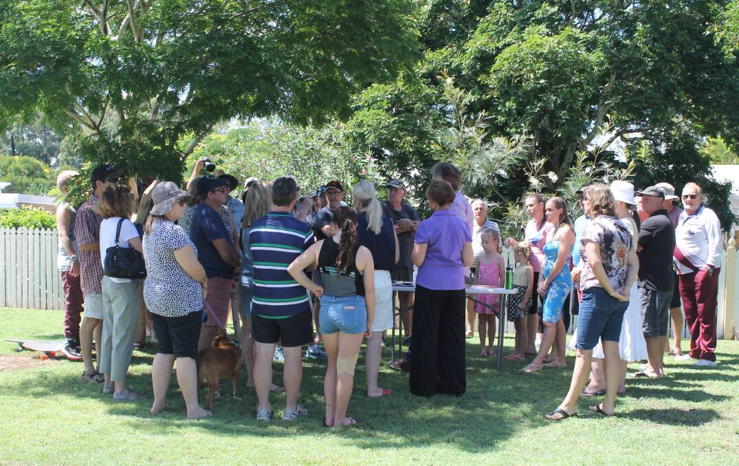 Residents meet on the side of Clay Gully Road to discuss the proposal. Photo: Cheryl Goodenough