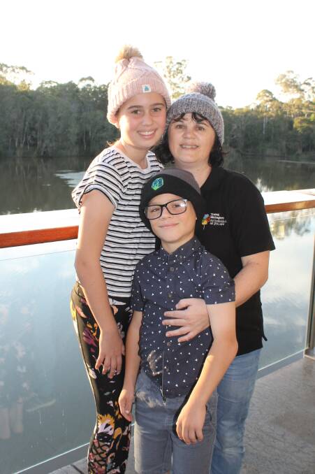 FUNDRAISERS: Erin Ross and her children Maia and Ryley will hold the Beanies for Brain Cancer event, with Elysium Restaurant and Bar and Travel Managers. Photo: Cheryl Goodenough